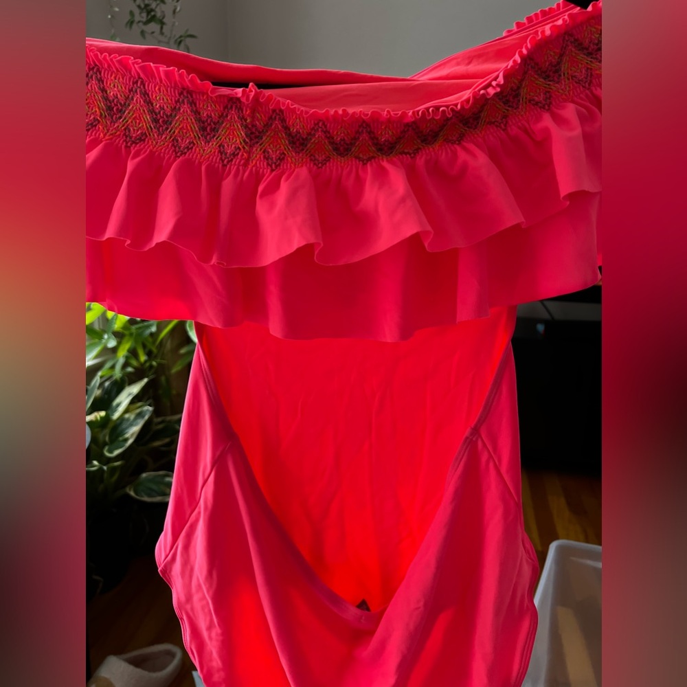Hot pink one piece with Aztec ruffles